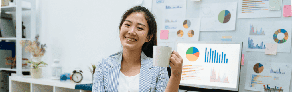 smshost.co.uk person-holding-mug-in-office-setting